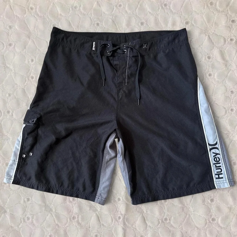 Hurley black and grey board shorts with gray side panels, size 38/XL
